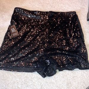 Women’s all black sequin high-waisted shorts
